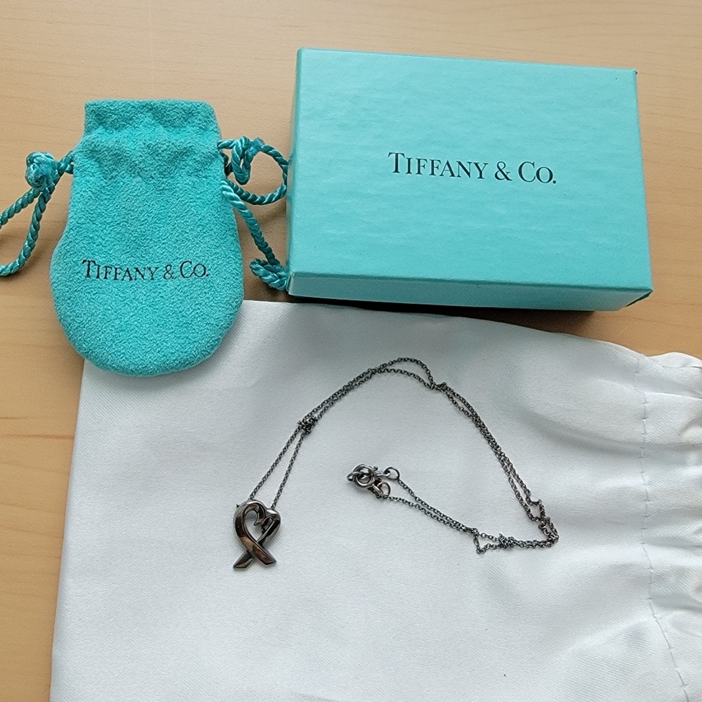 Tiffany & Co Loving Heart Pendant in Sterling Silver.
